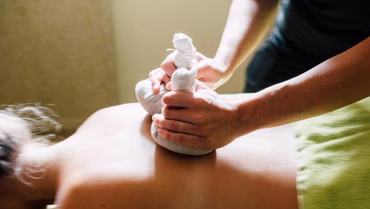 Herbal-stamp massage